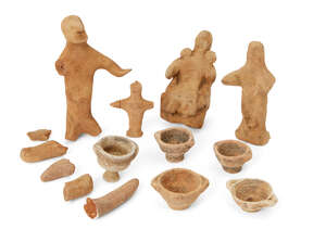A group of Cypriot buff pottery figures, Cyprus, early to first Millennium B.C., (11)
		 
		Provenance: Theo Sarmas (d. 2018) collection in London since ear