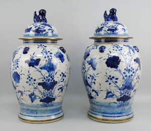 
	
		A pair of Chinese blue and white porcelain baluster jars and covers, late 20th/early 21st...
