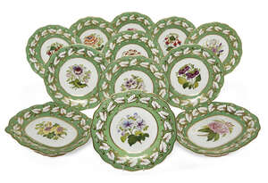 
	
		A Staffordshire Part Dessert service, c.1840, pattern number 558 in red, comprising: a...
