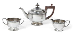 
	
		A late George V silver three-piece tea set, Birmingham, c.1933, JW Tiptaft & Son,...