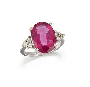 
	
		A pink tourmaline and diamond ring, the oval claw-set pink tourmaline weighing...