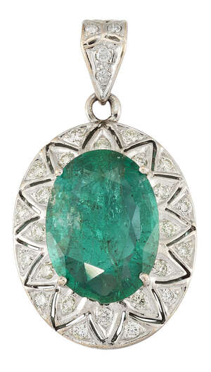 
	
		An emerald and diamond pendant, the oval emerald within a brilliant-cut diamond pierced...