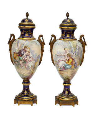 
	
		A pair of Continental Sevres style porcelain and gilt metal mounted urns, late 19th...