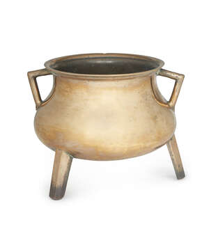 
	
		A North European bronze cauldron,17th/18th century, with angular side handles and three...