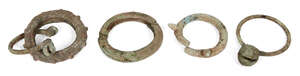 Five Chinese bronze bracelets, Neolithic period, one with chevron design, two cast with bells,...