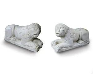 A pair of marble lions, in the Romanesque Style, by Giovanni Rizzardi, c.1980, one inscribed G.R. and each inscribed in black paint WA/11763/A/2, 55cm high, 
