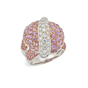 A pink sapphire and diamond ring, the pav&eacute; pink sapphire set foliate motif head with pav&eacute;...