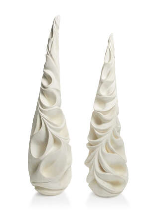 
	
		Halima Cassell (b.1975), a pair of carved clay forms 
		c.2010, unsigned 
		A large...