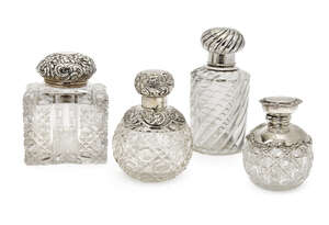 
	
		Four fine silver mounted cut glass vanity vessels comprising: a Victorian square hobnail...