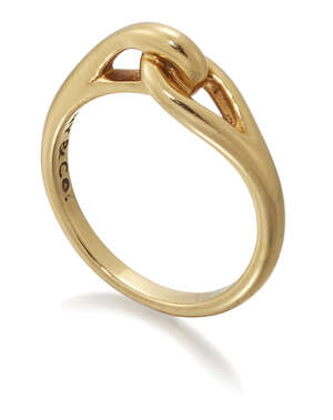 
	
		Tiffany & Co, a double loop ring by Tiffany, signed Tiffany & Co, 750, ring size...