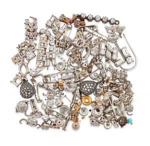 A group of diamond set components, including: a pav&eacute; single-cut diamond egg shaped drop; a pav&eacute;...