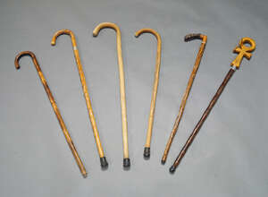
	
		A collection of six walking sticks, 20th century, one with a horn handle, one with a...