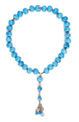 
	
		Turquoise pottery prayer beads, 20th century, on a white metal chain, 40cm. long

	

