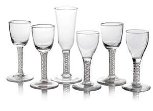 
	
		A pair of George II opaque twist stem wine glasses, c. 1750, conical feet, 12.1cm high,...