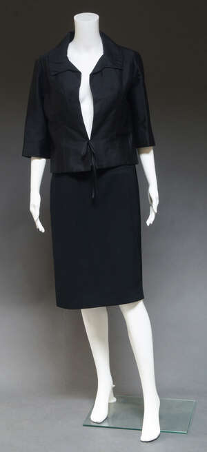 
	
		Chanel Couture, an early Chanel Couture black cropped jacket, edge to edge front with...