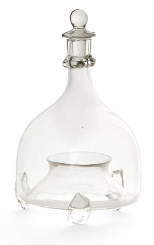 
	
		A late George III hand blown glass fly catcher, early 19th century, of onion form, with...