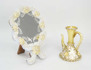 
	
		A Venetian clear and blue coloured shaped easel mirror, late 19th/early 20th century,...