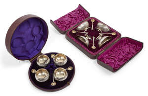 
	
		Two cased Victorian silver condiment sets, comprising a set of four rounded salt cellars,...