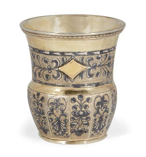 
	
		A Russian silver niello liqueur cup, Moscow, assay master and date marks rubbed, maker...