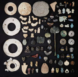 
	
		A large group of Near Eastern and Eastern Mediterranean beads and amulets 
		Late 5th...