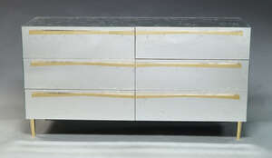 
	
		A textured mirrored sideboard, of recent manufacture, the rectangular top over an...