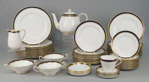 
	
		A Spode porcelain part dinner service, 20th century, with blue and tooled gilt rim, to...