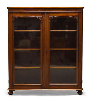 
	
		A Victorian mahogany bookcase, with two glazed cupboard doors enclosing three shelves,...