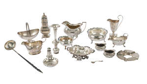 A quantity of miscellaneous silver, early 20th century, to include sugar bowl and cream jug, sugar caster, swing handled bowl, helmet shape milk jug, sauce boa
