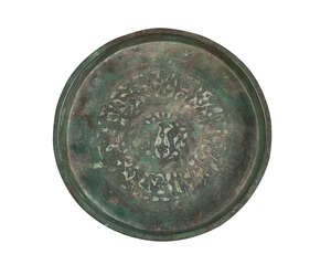 
	
		A Khorassan engraved bronze dish, Iran, 12th century, the centre well engraved with...