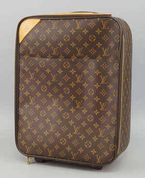 
	
		A Louis Vuitton monogram trolley cabin case, two wheels and extendable handle 

	

