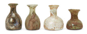 Four Roman miniature glass vessels, circa 1st-4th century AD, all with squat body and fared rim, tallest 5.6cm. high (6)
		 
		Provenance: Private collectio
