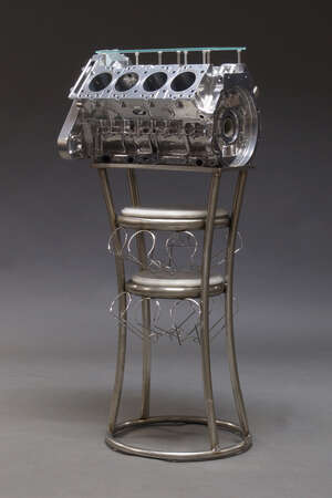 
	
		A V8 engine block converted to a wine rack, of recent manufacture, the engine block with...