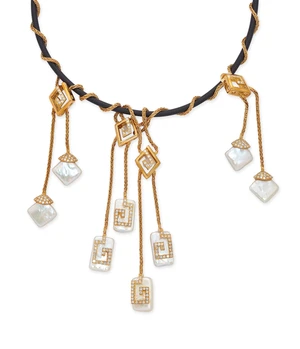 A freshwater cultured pearl and diamond necklace, designed as a rubber cord with wrapped...