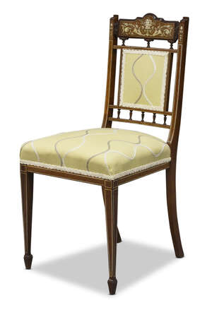 
	
		An Edwardian rosewood and ivory inlaid side chair, the shaped crest rail with urn and...