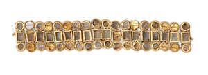 
	
		A Roman glass inlaid gold bracelet, formed of connecting elements of squares and...