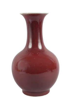 
	
		A Chinese porcelain monochrome bottle vase, 19th century, with flared rim, slender neck...