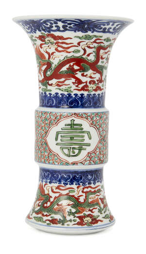 
	
		A Chinese wucai porcelain gu vase, late Qing dynasty, painted to the neck and base with...