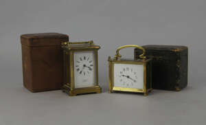 
	
		A brass carriage timepiece, early 20th century, the white enamel dial with Roman numeral...