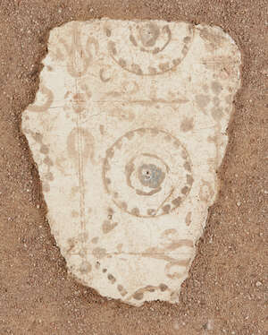 
	
		A Roman fresco fragment 
		Circa 1st Century A.D.
		The ochre decoration on a cream...