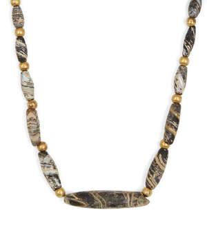 
	
		A Roman banded glass beaded necklace
		Circa 1st-4th Century A.D.
		Composed of...