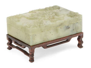 
	
		A Chinese hardstone rectangular box and cover, early 20th century, the cover carved in...