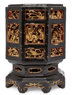 
	
		A Chinese lacquered wood octagonal box and cover, late 19th century, with gilt and carved...
