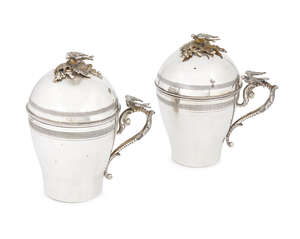 
	
		A pair of Turkish Ottoman Empire silver cups and covers, the domed cover with bird...