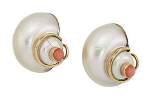 
	
		A pair of shell earrings, by Trianon, designed as white shells, umbonian elegans, each...