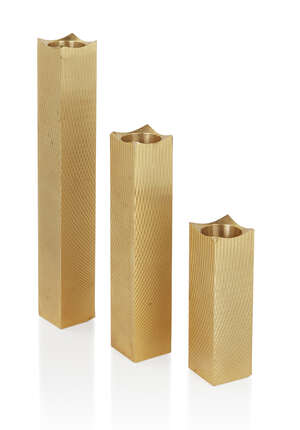 
	
		Francois de Gross, 
		 
		Set of three engine turned candlesticks, circa 1970, 
		Gold...