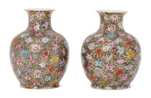 
	
		A pair of Chinese porcelain millefleurs vases, Republic period, painted in famille rose...