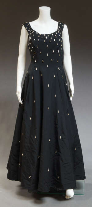 
	
		A collection of vintage evening and cocktail gowns, to include a full length black...