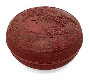 
	
		A Chinese cinnabar lacquer circular box and cover, 19th century, carved with Han Xiangzi...