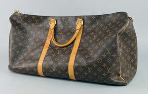 
	
		A Louis Vuitton monogram holdall, with tan leather handles and trim and single top zip,...