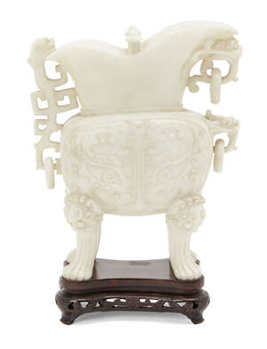 
	
		A Chinese white hardstone archaistic ritual pouring vessel, jue, early 20th century, 